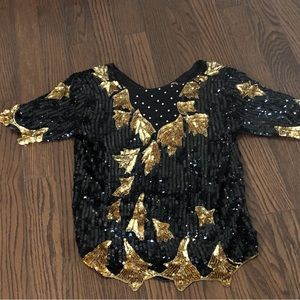 T.L.B. Black and gold medium